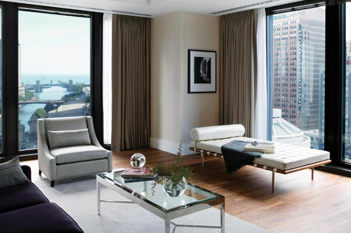 Suite with Lake View at The Langham, Chicago featuring luxury decor and panoramic lake views